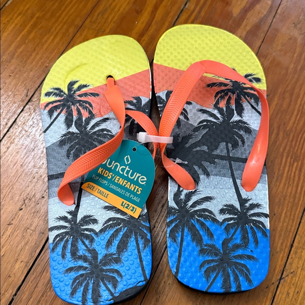 Kuncture Kids' Orange and Yellow Flip Flops
